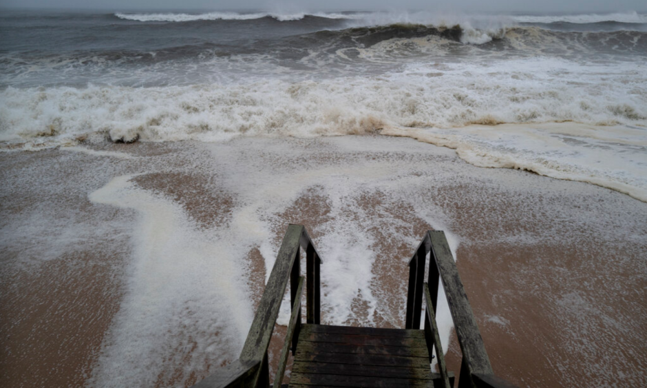 Waves pound the beaches of Montauk, New York, on Sunday as Tropical Storm Henri approaches. Credit: Craig Ruttle, AP