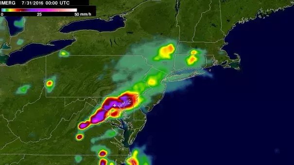 This image shows instantaneous IMERG-estimated rainfall rates at 8 p.m. EDT on July 30, 2016. It depicts a strong band of heavy rain (an inch per hour in purple areas) extending east-west over north-central Maryland extending southwestward into northern Virginia. Image: Hal Pierce / NASA / JAXA