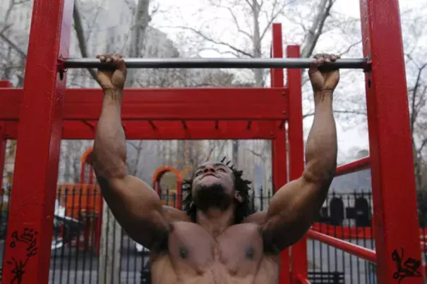 A man exercises in Manhattan during an unseasonably warm December Sunday. Lucas Jackson / Reuters
