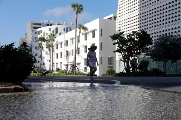 A flooded street in Miami Beach, Fla. So-called sunny-day flooding is happening more often. (Credit: Lynne Sladky/AP)