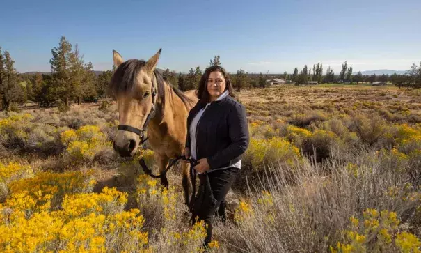 Shelby Edwards, of Bend, Oregon, is considering relocating to escape the smoke and falling ash that has diminished her quality of life. Photo: Charlie Litchfield, The Guardian